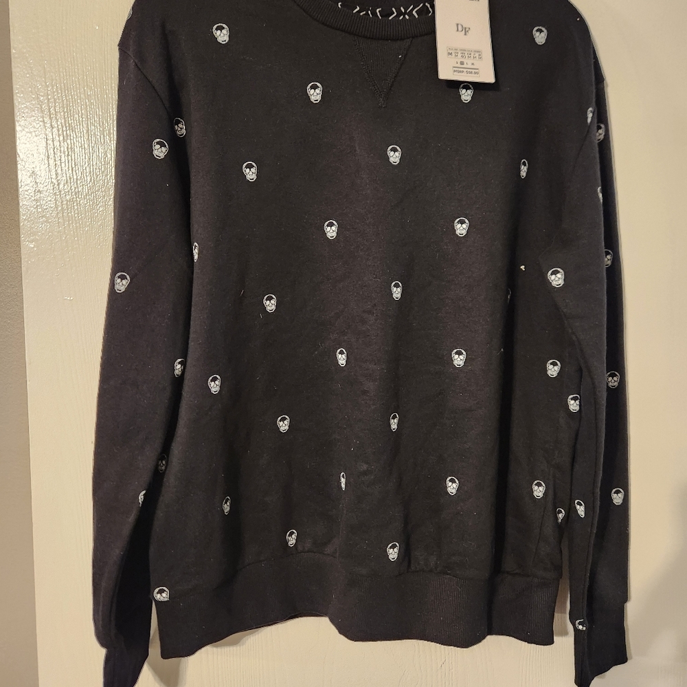 Denim and flower sweater